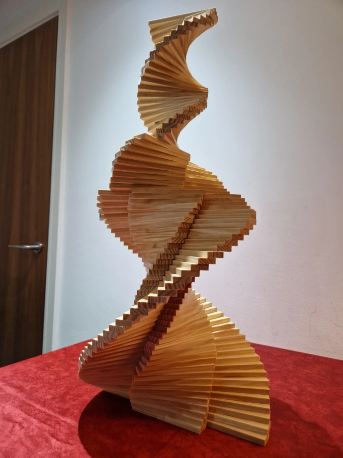 Helix A mesmerizing spiral tower structure representing a double helix, crafted entirely from Kapla planks—an elegant display of balance, symmetry, and motion.